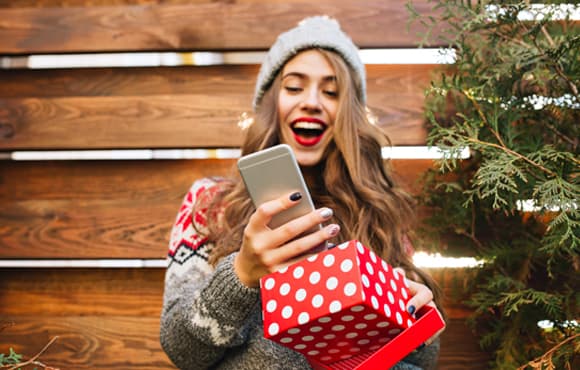 People enjoying a Secret Santa exchange