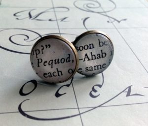 Book-themed cufflinks.