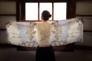 Literary-themed scarf.