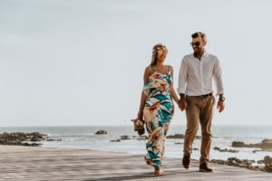 couple strolling on beach