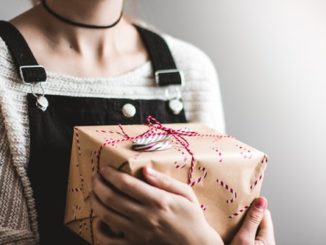 girl holding gift