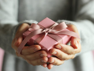 The easiest way to draw names out of a hat online is with a Secret Santa generator.