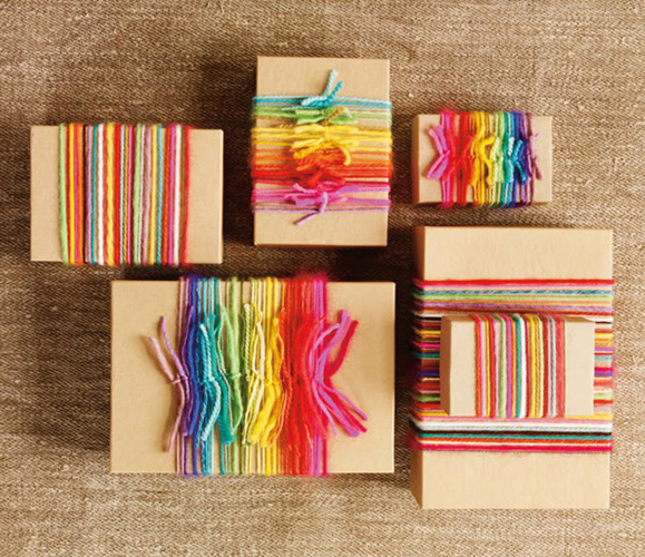gifts wrapped in rainbow yarn