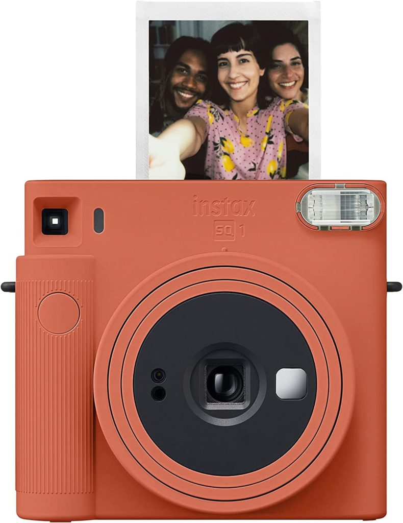 instax camera in terracotta