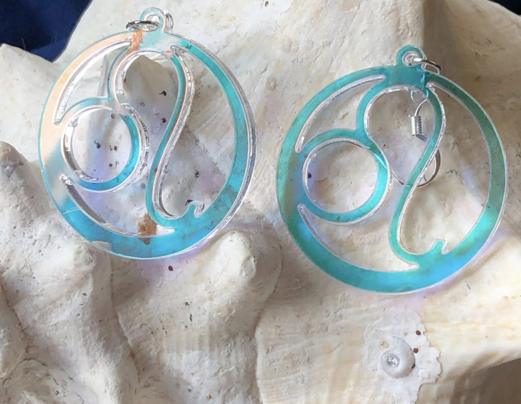 Iridescent earrings to make a bold statement for Leo birthday